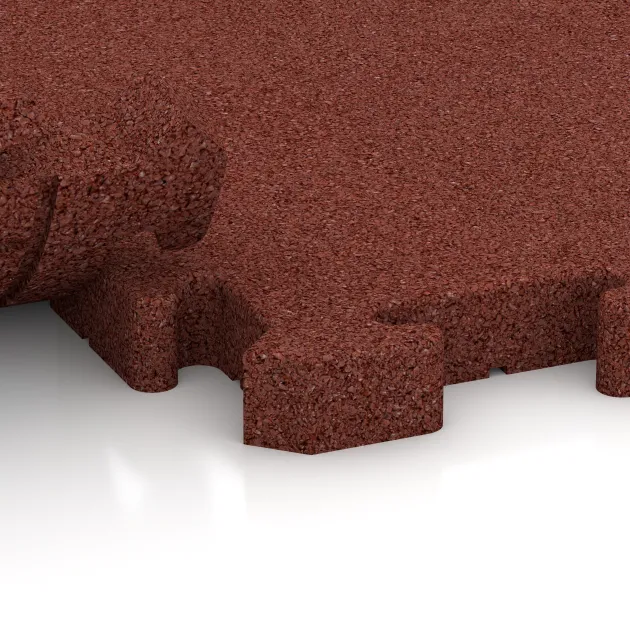 Großaufnahme vom Verbindungssystem von WARCO-Boden 3652 - Paddockmatte im Farbdesign Opečno rdeča. Abmessungen 500 x 500 x 40 mm.