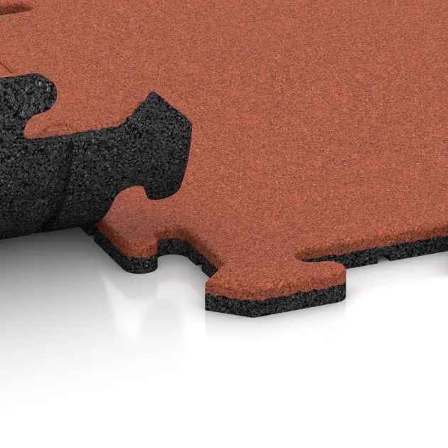 Großaufnahme vom Verbindungssystem von WARCO-Boden 6218 - Športna plošča 1,8 cm im Farbdesign Svetlo rdeče-oranžna. Abmessungen 500 x 500 x 18 mm.