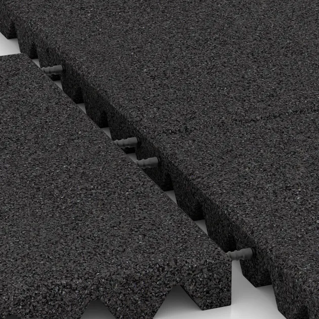 Großaufnahme vom Verbindungssystem von WARCO-Boden 0660 - Gumijasta varovalna plošča za otroška igrišča im Farbdesign Antracit. Abmessungen 500 x 500 x 45 mm.