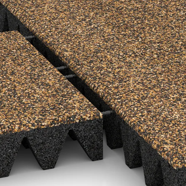 Großaufnahme vom Verbindungssystem von WARCO-Boden 3702 - Gumijasta varovalna plošča za otroška igrišča im Farbdesign Maroko. Abmessungen 500 x 500 x 100 mm.