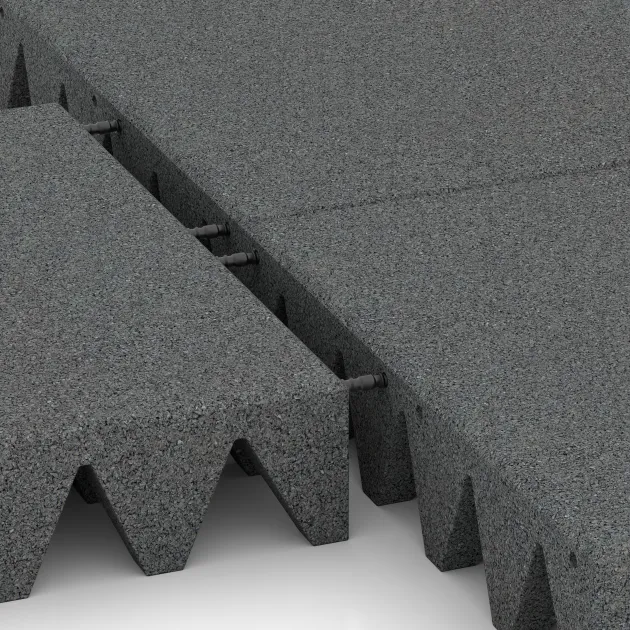 Großaufnahme vom Verbindungssystem von WARCO-Boden 0747 - Gumijasta varovalna plošča za otroška igrišča im Farbdesign Lupkovosiva. Abmessungen 500 x 500 x 100 mm.