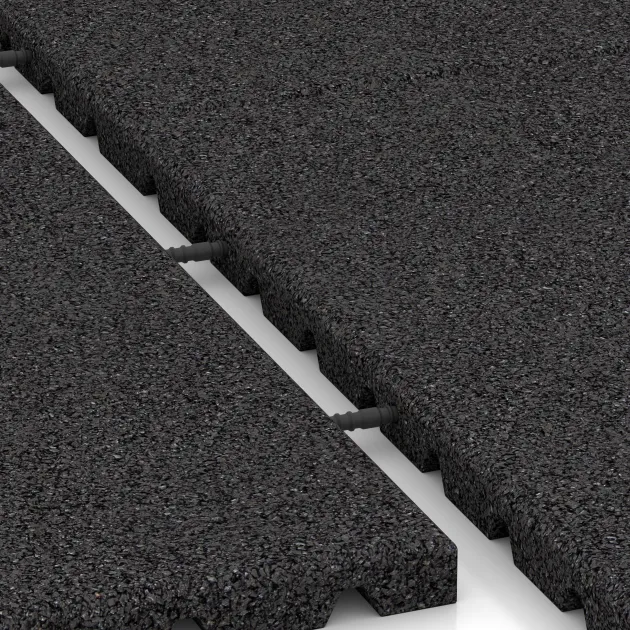 Großaufnahme vom Verbindungssystem von WARCO-Boden 0750 - Trittschutzmatte Pferdebox im Farbdesign Antracit. Abmessungen 1000 x 1000 x 30 mm.