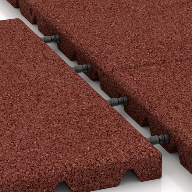 Großaufnahme vom Verbindungssystem von WARCO-Boden 0521 - Gumijasta varovalna plošča za otroška igrišča im Farbdesign Opečno rdeča. Abmessungen 400 x 400 x 30 mm.