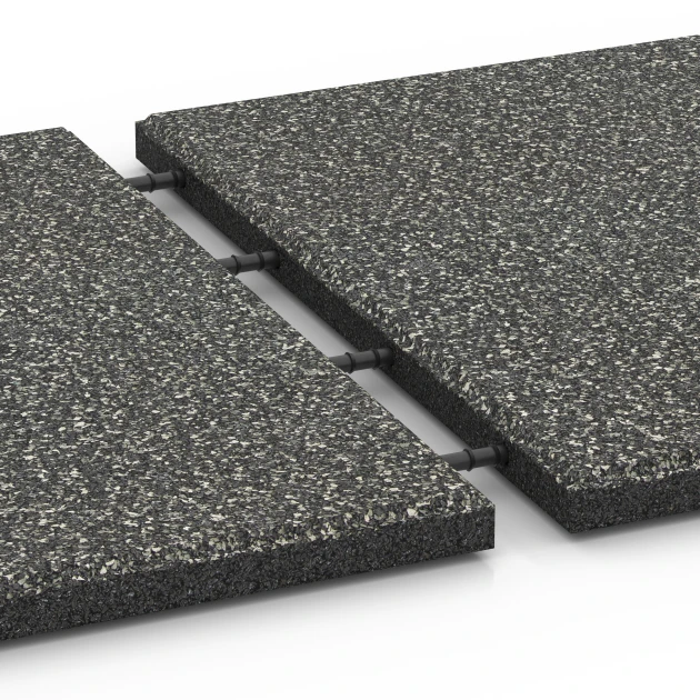 Großaufnahme vom Verbindungssystem von WARCO-Boden 6413 - Gumijasta varnostna plošča – 90 cm im Farbdesign Temnosivi granit. Abmessungen 50 x 50 x 3 cm.