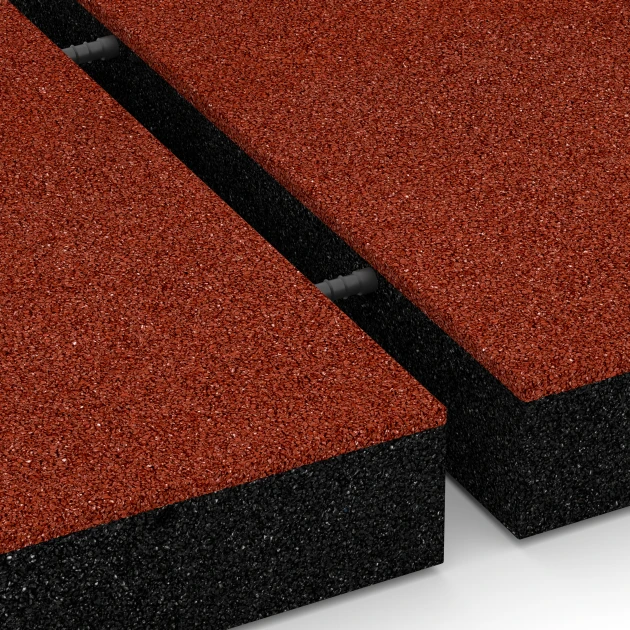 Großaufnahme vom Verbindungssystem von WARCO-Boden 6272 - Gumijasta varnostna plošča – 230 cm im Farbdesign Opečno rdeča. Abmessungen 50 x 50 x 8 cm.