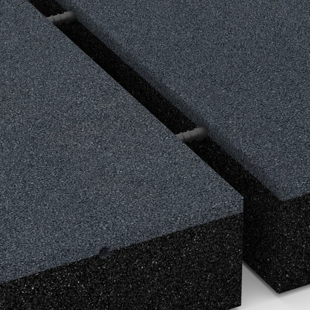 Großaufnahme vom Verbindungssystem von WARCO-Boden 6281 - Gumijasta varnostna plošča – 300 cm im Farbdesign Skrilavosiva. Abmessungen 50 x 50 x 11 cm.