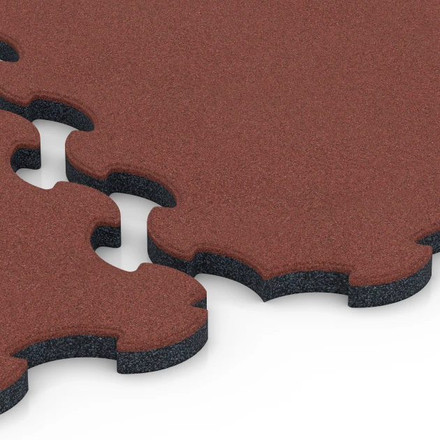 Großaufnahme vom Verbindungssystem von WARCO-Boden 6392 - Stallmatte Puzzle im Farbdesign Opečno rdeča. Abmessungen 102,5 x 102,5 x 3 cm | 1,05 m².