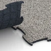 Großaufnahme vom Verbindungssystem von WARCO-Boden 6833 - Fitness Active talna obloga im Farbdesign Sivi granit. Abmessungen 97,1 x 97,1 × 1,8 cm.